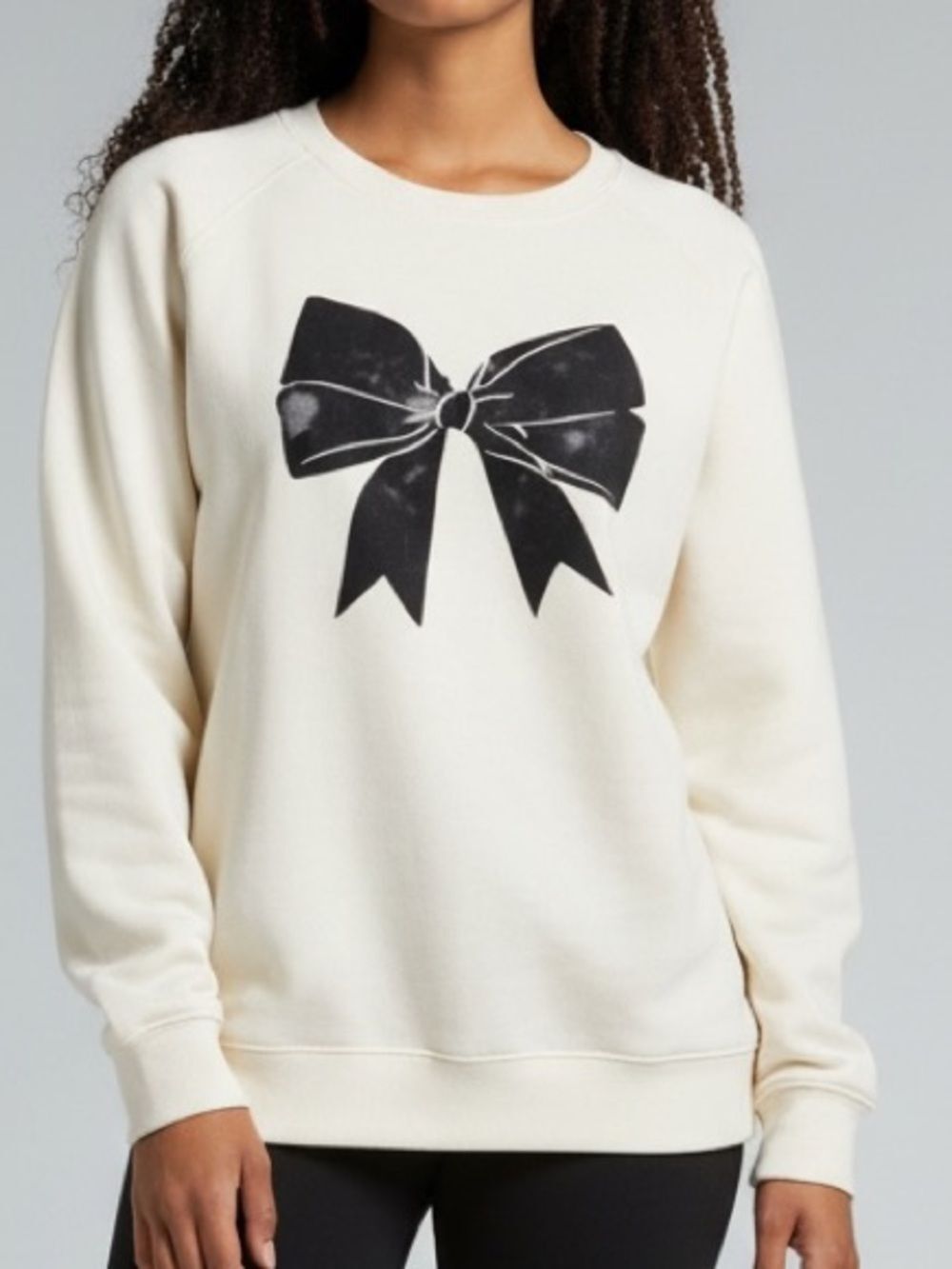 Cream Sweatshirt with Black Bow Design